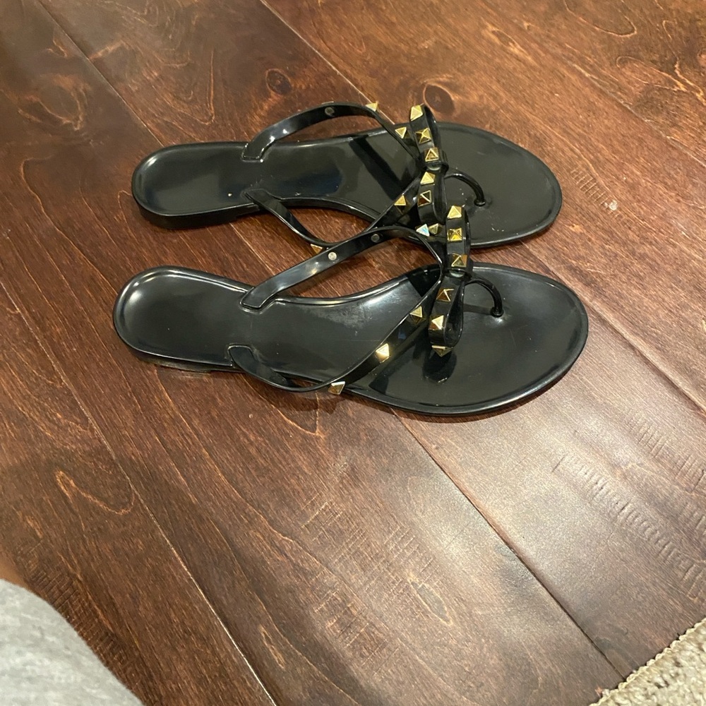Stylish Black Sandals with Gold Accents